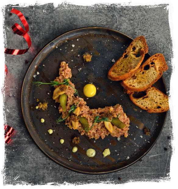 BEEF TARTARE SERVED WITH CROUTONS